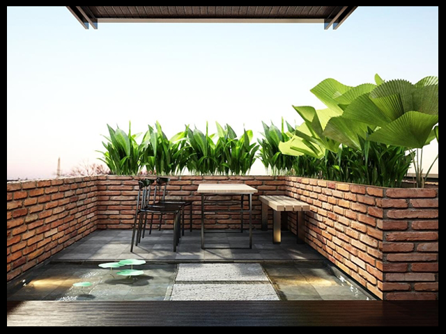 Không gian tại tầng tum của nhà ống đẹp 3 tầng 4x15m được phủ thảm xanh thực vật, làm tăng thêm sức sống cho mặt tiền